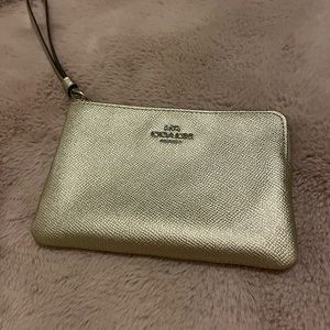 Like new Coach gold wristlet